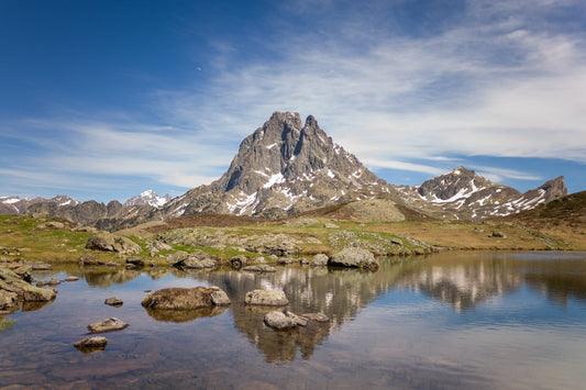 The Pic du Midi d'Ossau is reflected on the Miey lake, Pyrenees, Ossau valley. - Photo to download