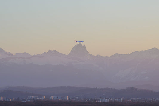 The Pyrenees mountain range during a superb sunrise with pink hues